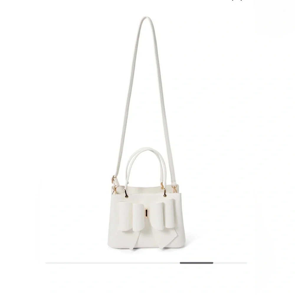 Like Dreams
Jenna Bow Satchel - Picture 6 of 12